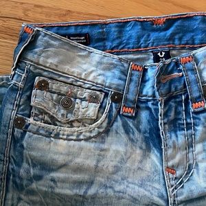 BRAND NEW. Worn once. Size W29. Orange stitching